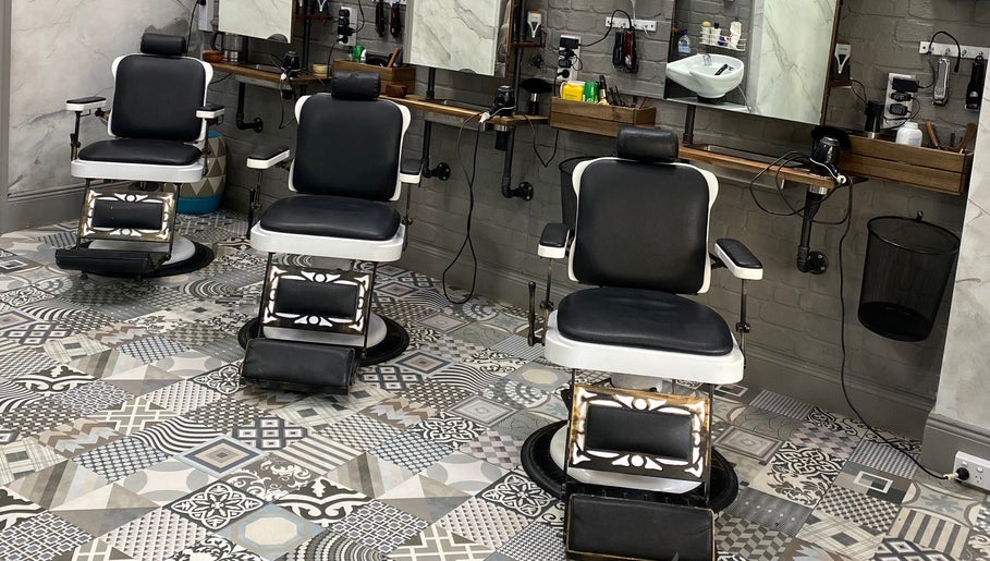 Elegant barber chairs at Broadway Barbershop, Ultimo, NSW, AU, featuring vintage design and comfort.