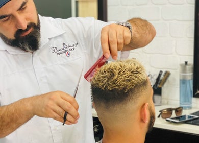 Barber at Broadway Barbershop, Ultimo NSW, crafting a stylish haircut with precision.