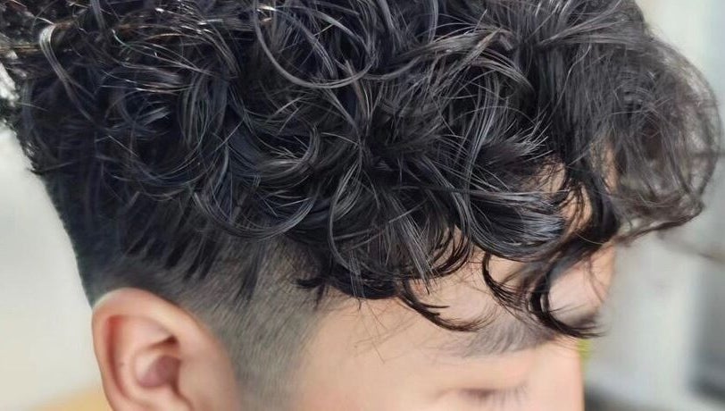 Close-up of textured curls styled at Highland Hair Salon, Melbourne, Victoria, AU.