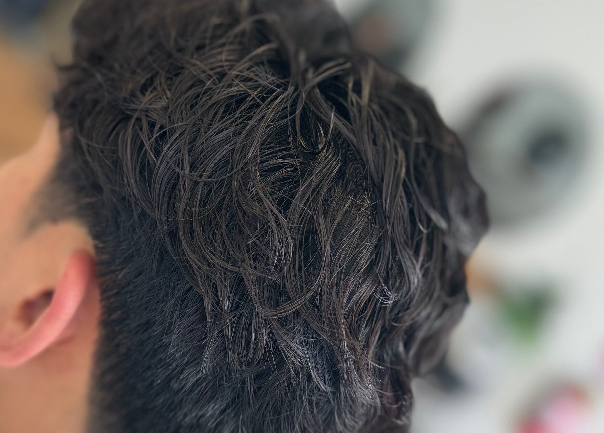 Close-up of a trendy haircut at Highland Hair Salon, Melbourne, Victoria, AU.