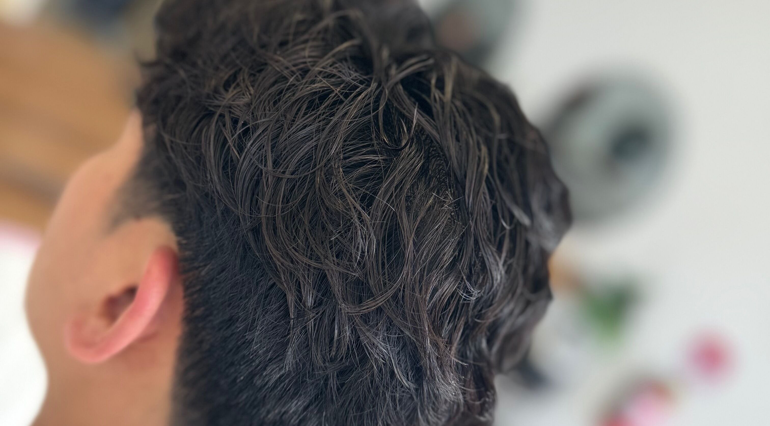 Close-up of a trendy haircut at Highland Hair Salon, Melbourne, Victoria, AU.