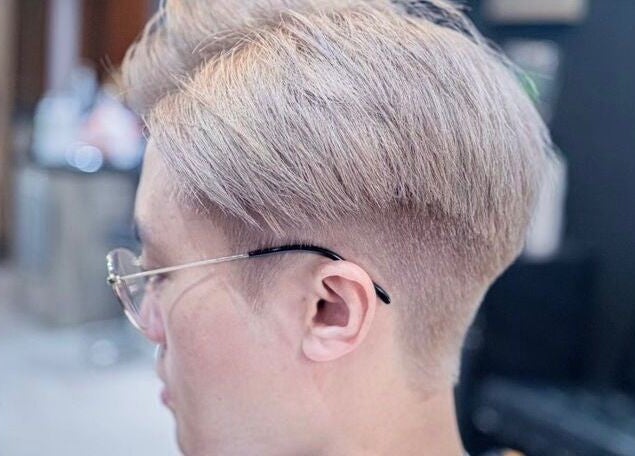 Trendy blonde haircut at Highland Hair Salon, Melbourne, Victoria, AU.