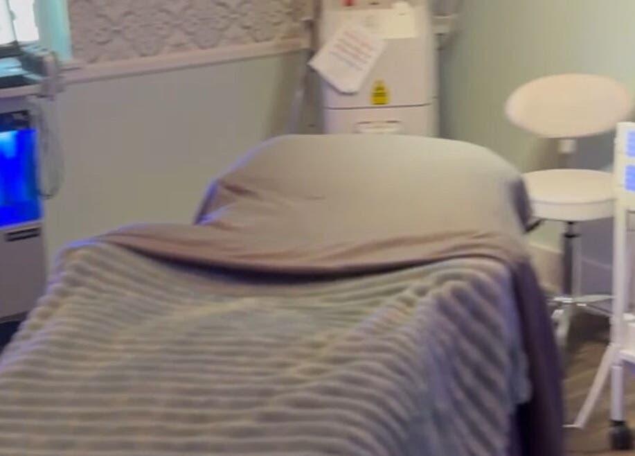 Cozy treatment room at The Skin Institute in Ocean Springs, Mississippi, US, offering a relaxing ambiance.