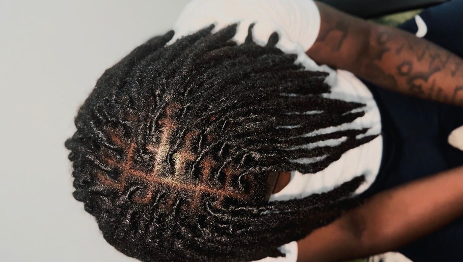 Intricate dreadlock style at Locced by Ny, Coventry, England, GB, showcasing skilled craftsmanship.