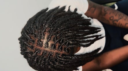 Intricate dreadlock style at Locced by Ny, Coventry, England, GB, showcasing skilled craftsmanship.