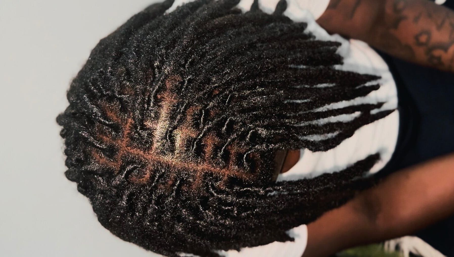 Freshly styled locs at Locced by Ny in Coventry, England, GB showcase intricate detailing.