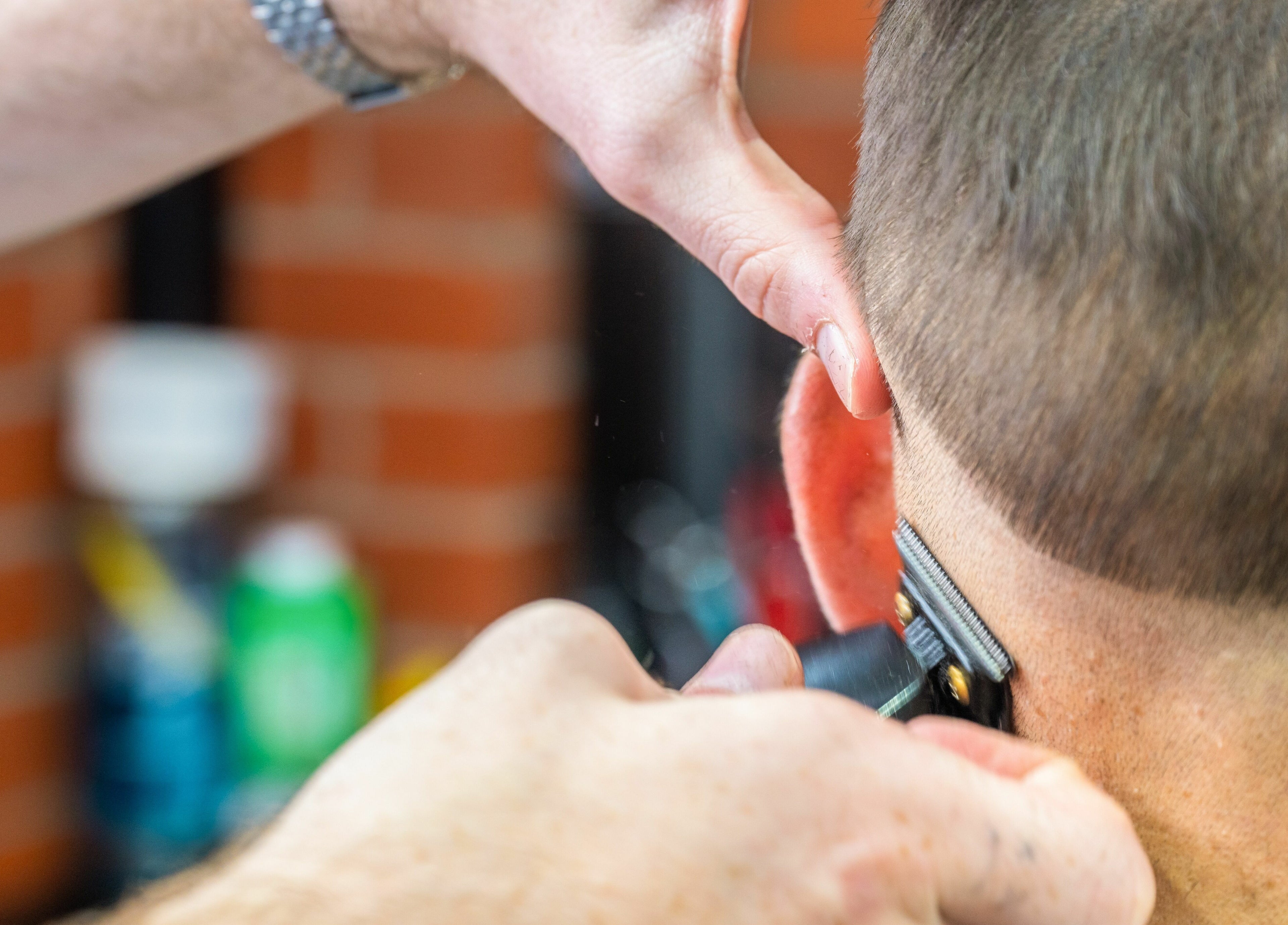Professional haircut in progress at Rex and Ross Barber - Newtown, Victoria, AU.