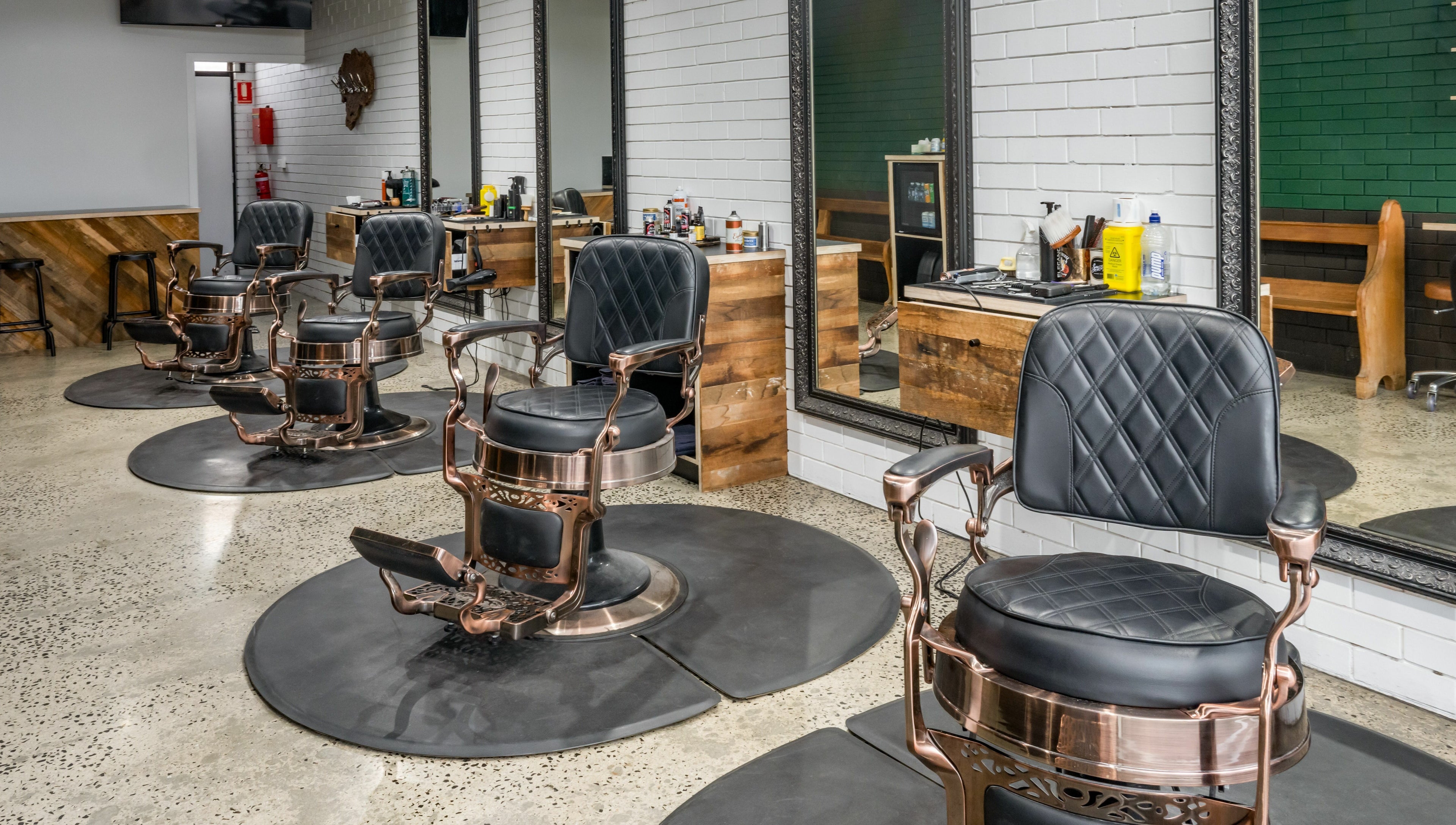 Elegant barber chairs at Rex and Ross Barber - Geelong West, Geelong West, Victoria, AU reflecting luxury style.