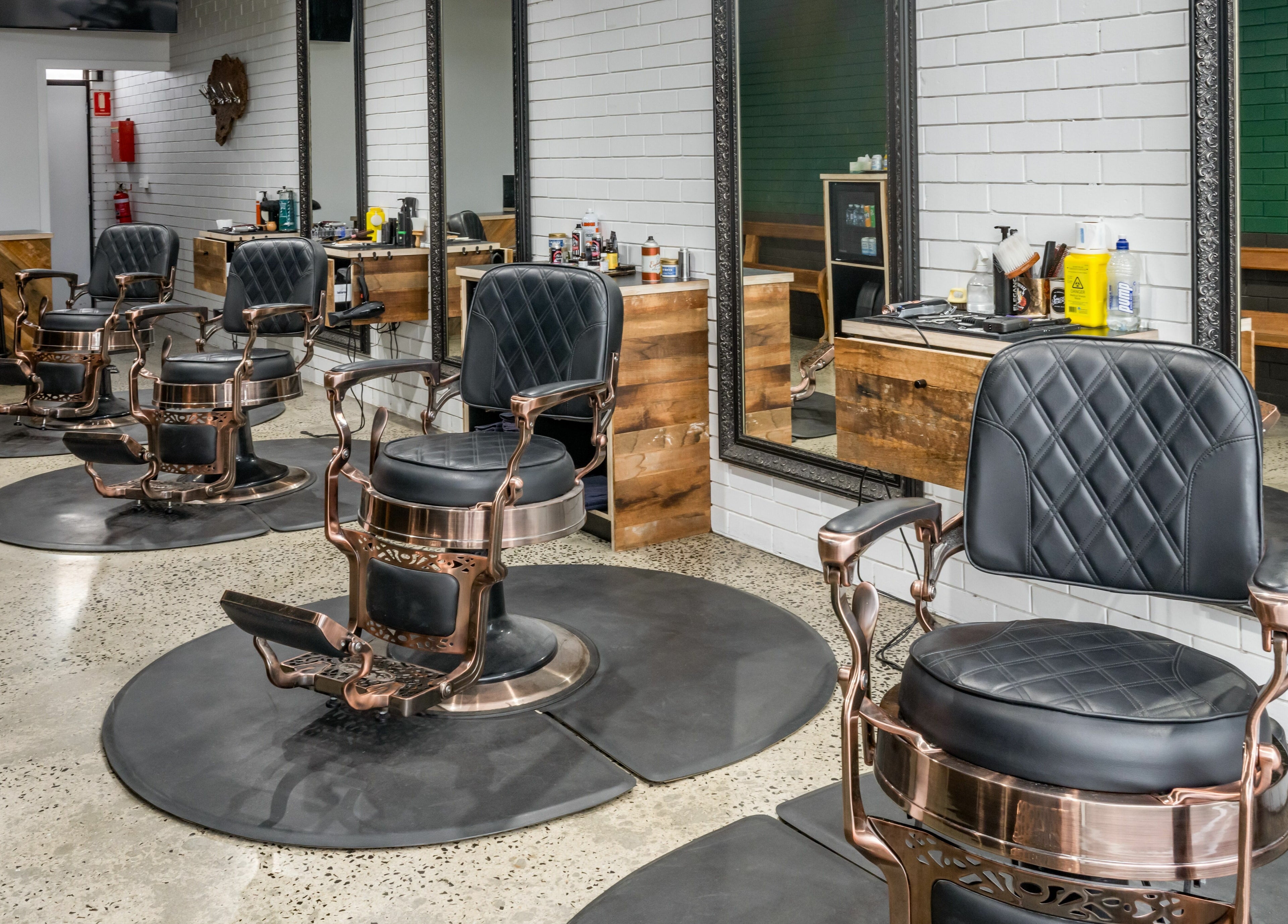 Elegant barber chairs at Rex and Ross Barber - Geelong West, Geelong West, Victoria, AU reflecting luxury style.