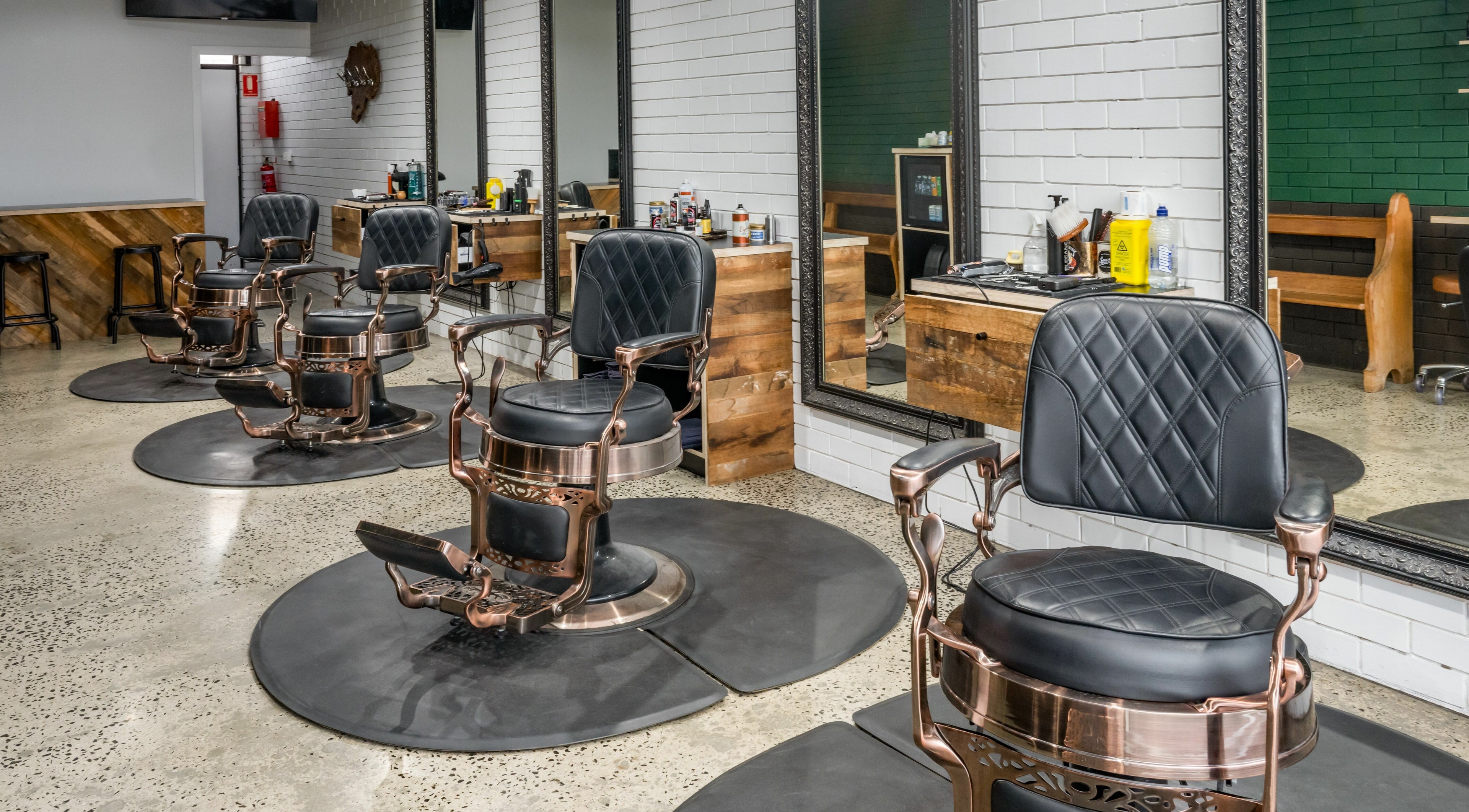 Elegant barber chairs at Rex and Ross Barber - Geelong West, Geelong West, Victoria, AU reflecting luxury style.