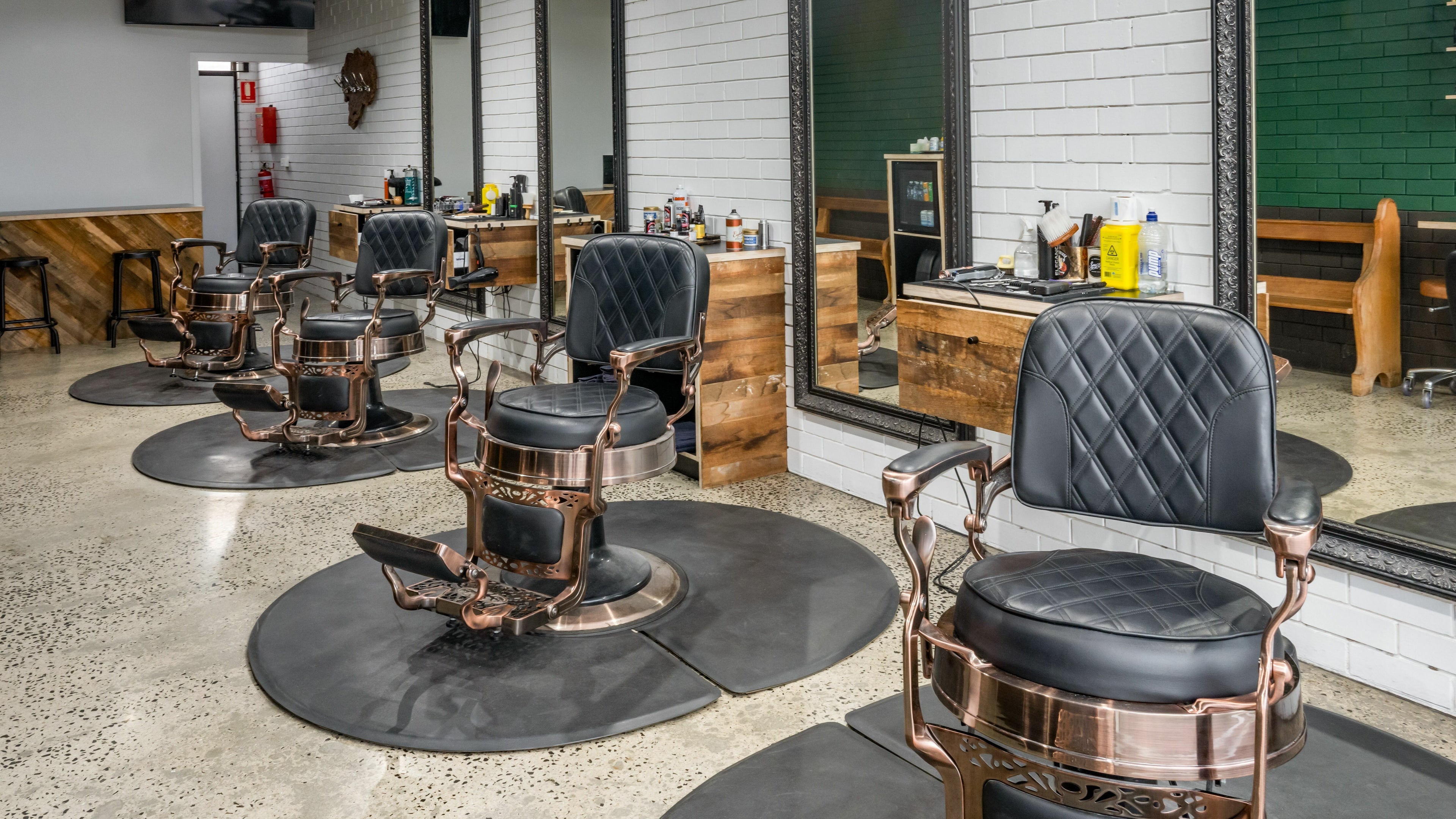 Elegant barber chairs at Rex and Ross Barber - Geelong West, Geelong West, Victoria, AU reflecting luxury style.