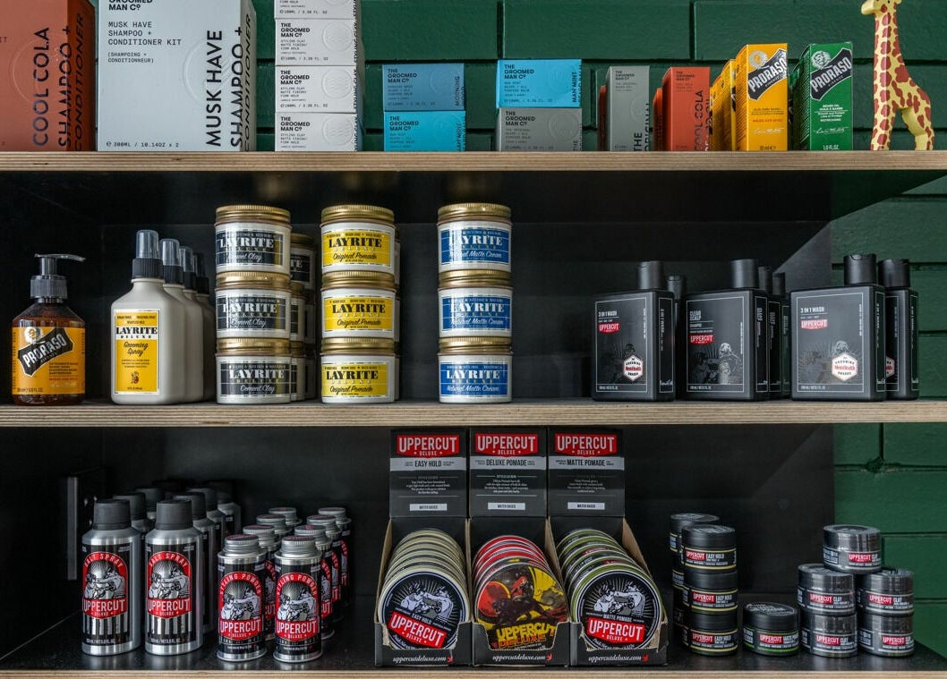 Grooming products on shelves at Rex and Ross Barber - Geelong West, Geelong West, Victoria, AU.