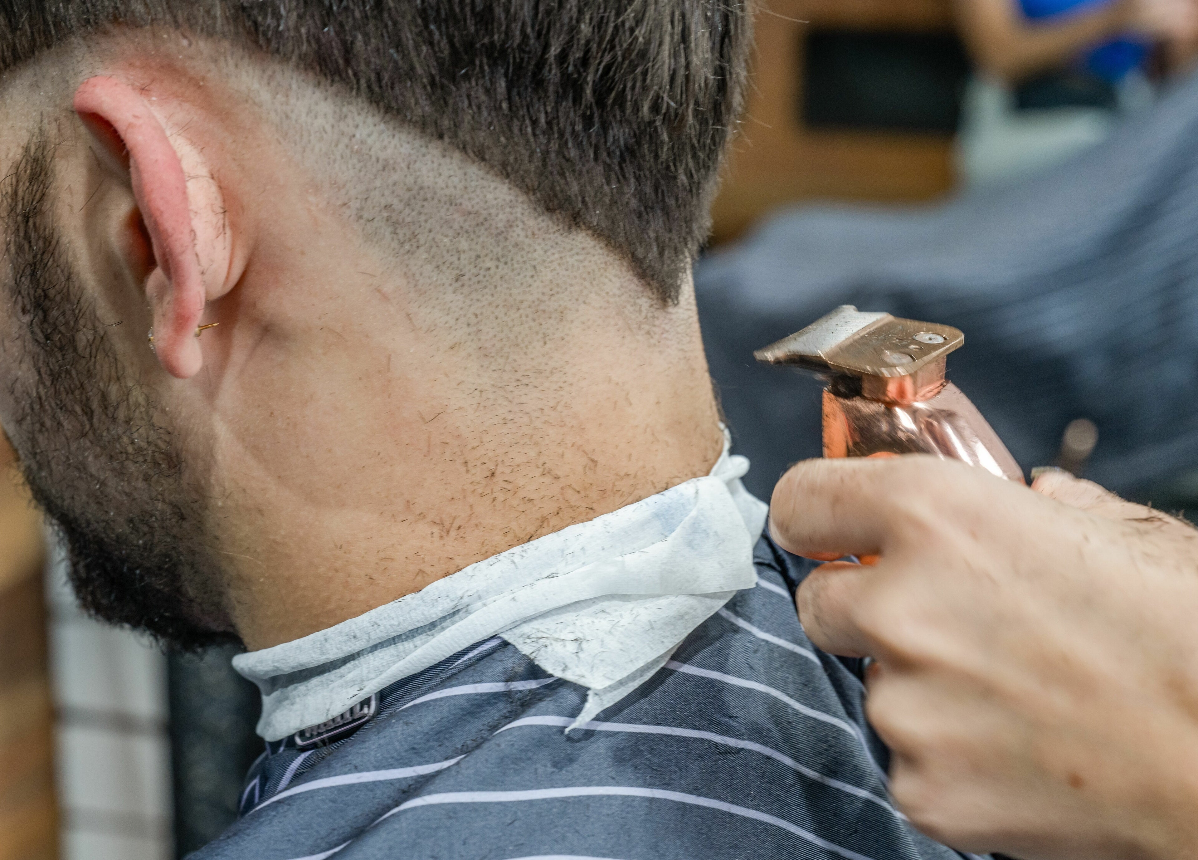 Close-up of haircut at Rex and Ross Barber - Geelong West in Victoria, AU, showing precise trimmer detail.