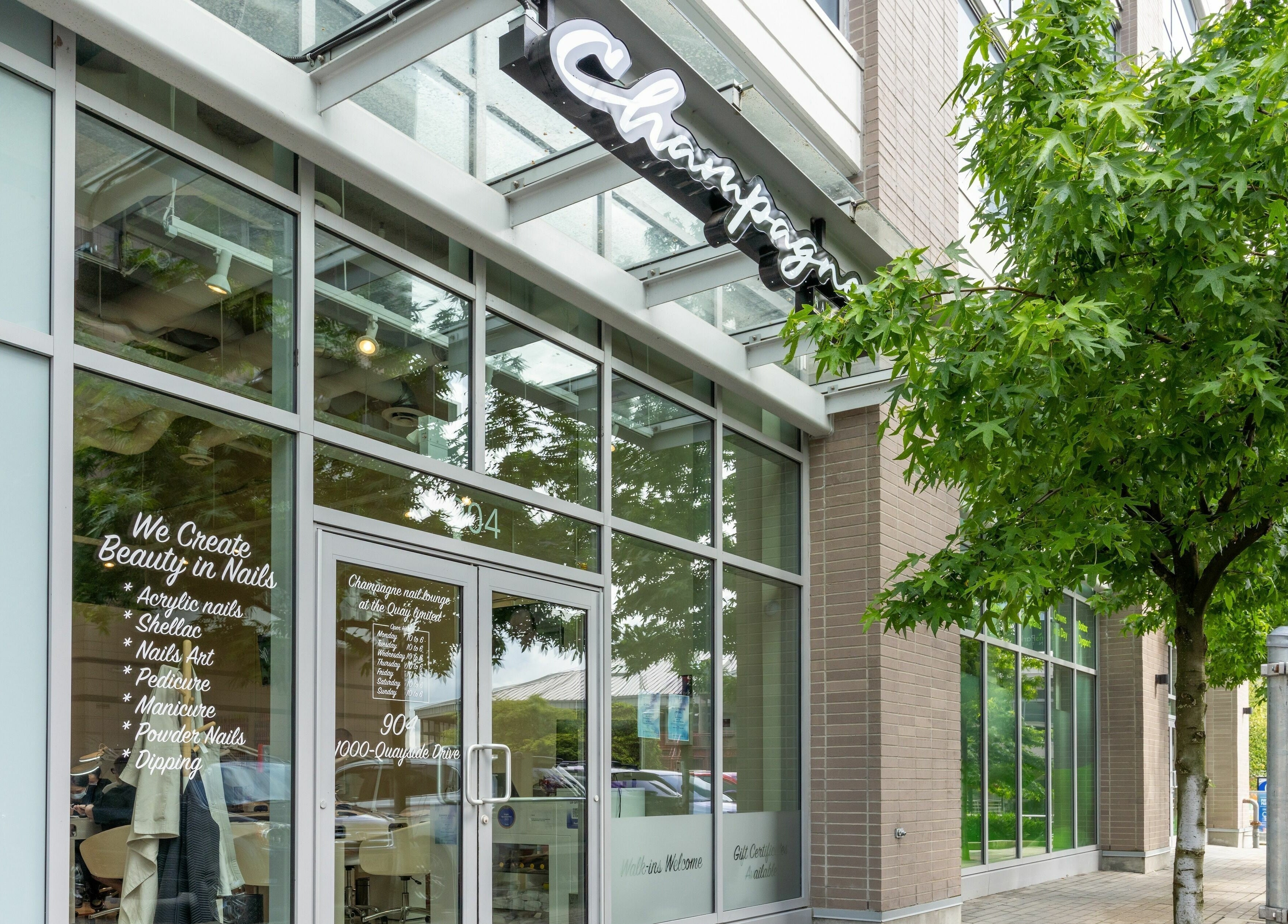 Front entrance of Champagne Nail Lounge at the Quay, New Westminster, British Columbia, CA.
