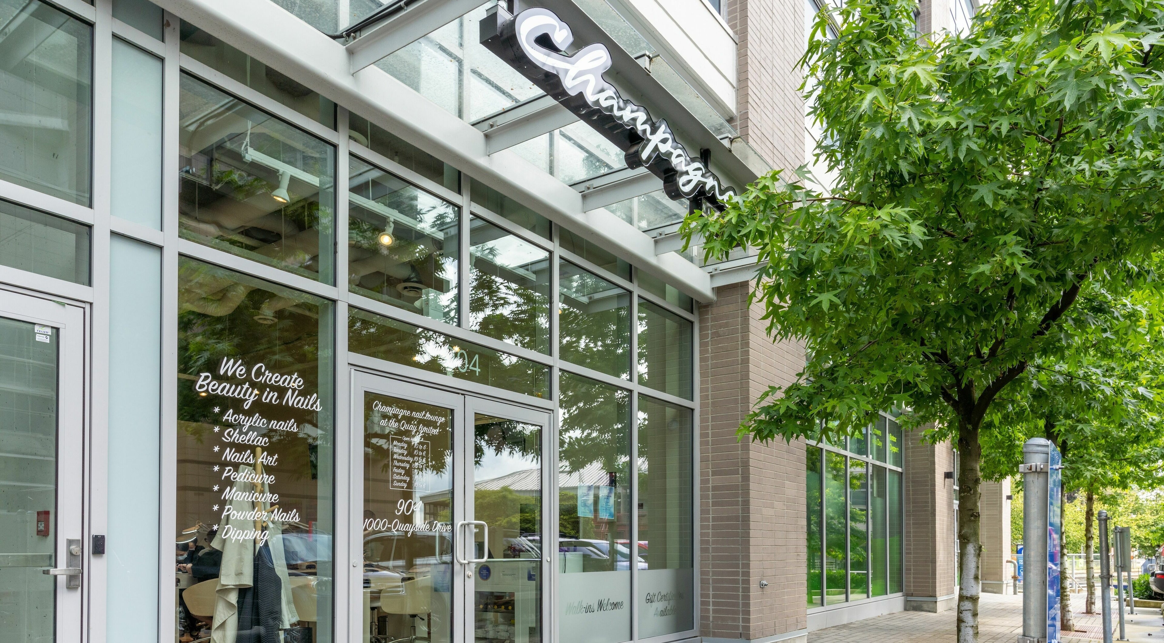 Front entrance of Champagne Nail Lounge at the Quay, New Westminster, British Columbia, CA.