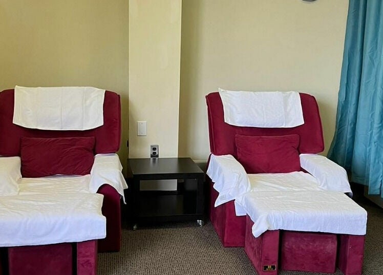 Cozy massage chairs at RTC Massage in Reston, Virginia, US with plush cushions and calming ambiance.