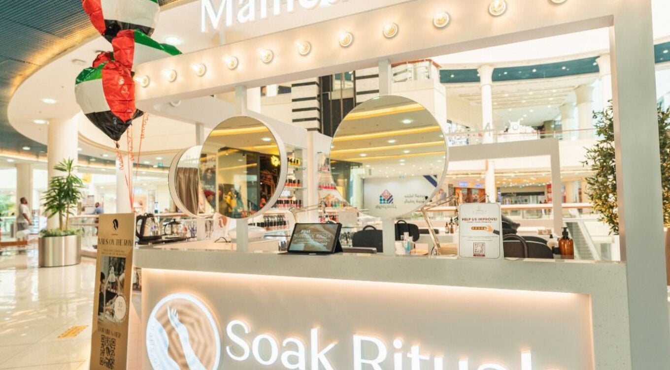 Nails Rituals Kiosk For Him & Her, a chic venue in Abu Dhabi, AE, inside a bustling shopping mall.
