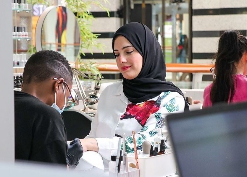 Customer enjoying manicure at Nails Rituals Kiosk For Him & Her, أبو ظبي, أبو ظبي, AE.