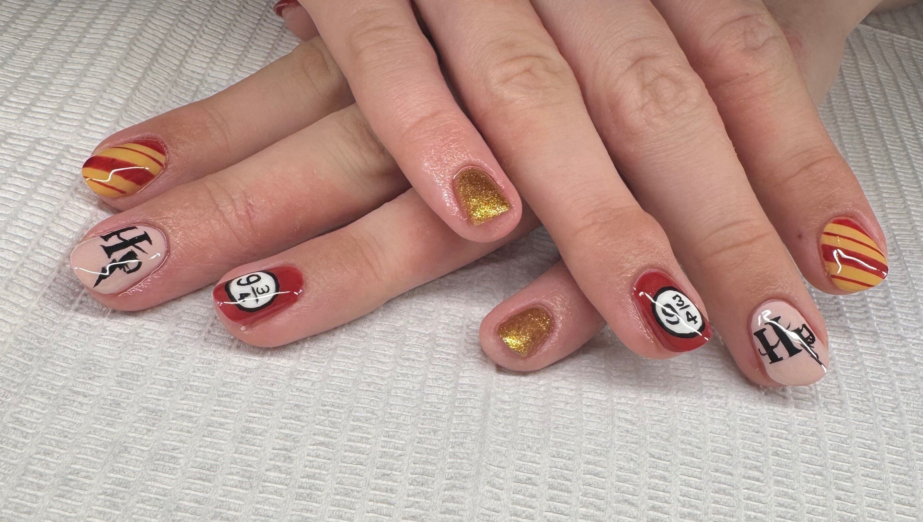Intricate Harry Potter-themed nail art at Lara McLeish Beauty Box, Rhiwlas, Wales, GB.