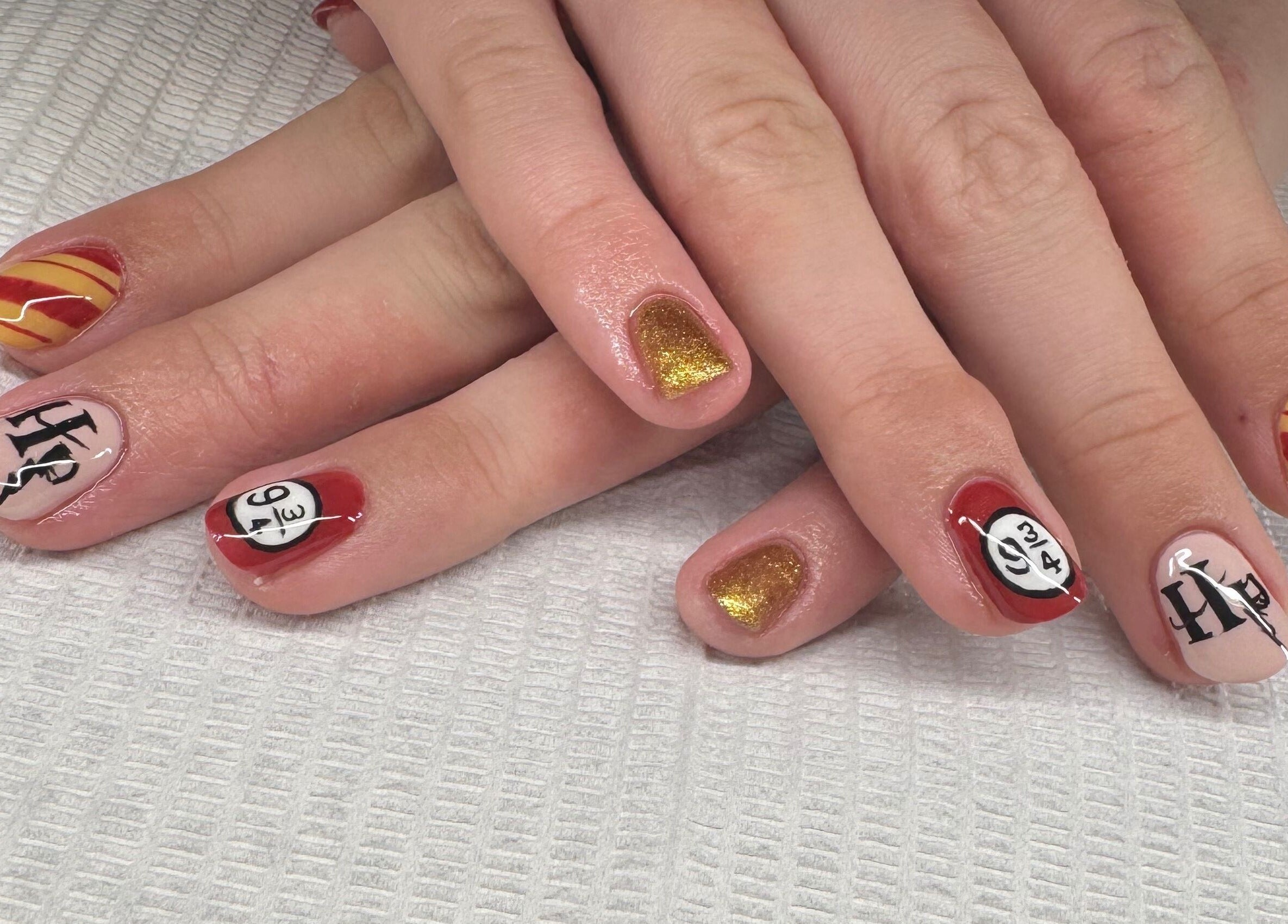 Intricate Harry Potter-themed nail art at Lara McLeish Beauty Box, Rhiwlas, Wales, GB.