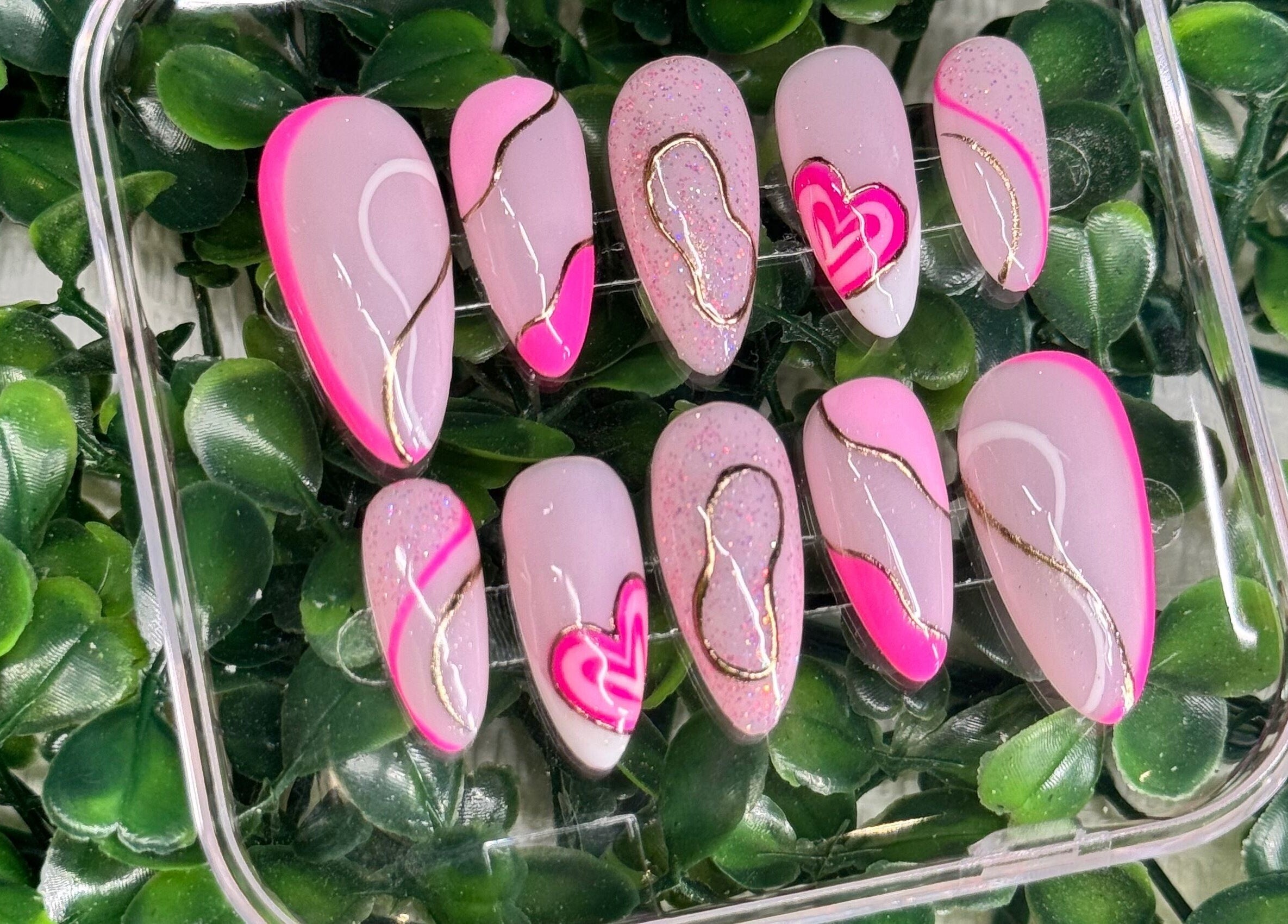 Pink nail art with gold accents at Lara McLeish Beauty Box, Rhiwlas, Wales, GB.