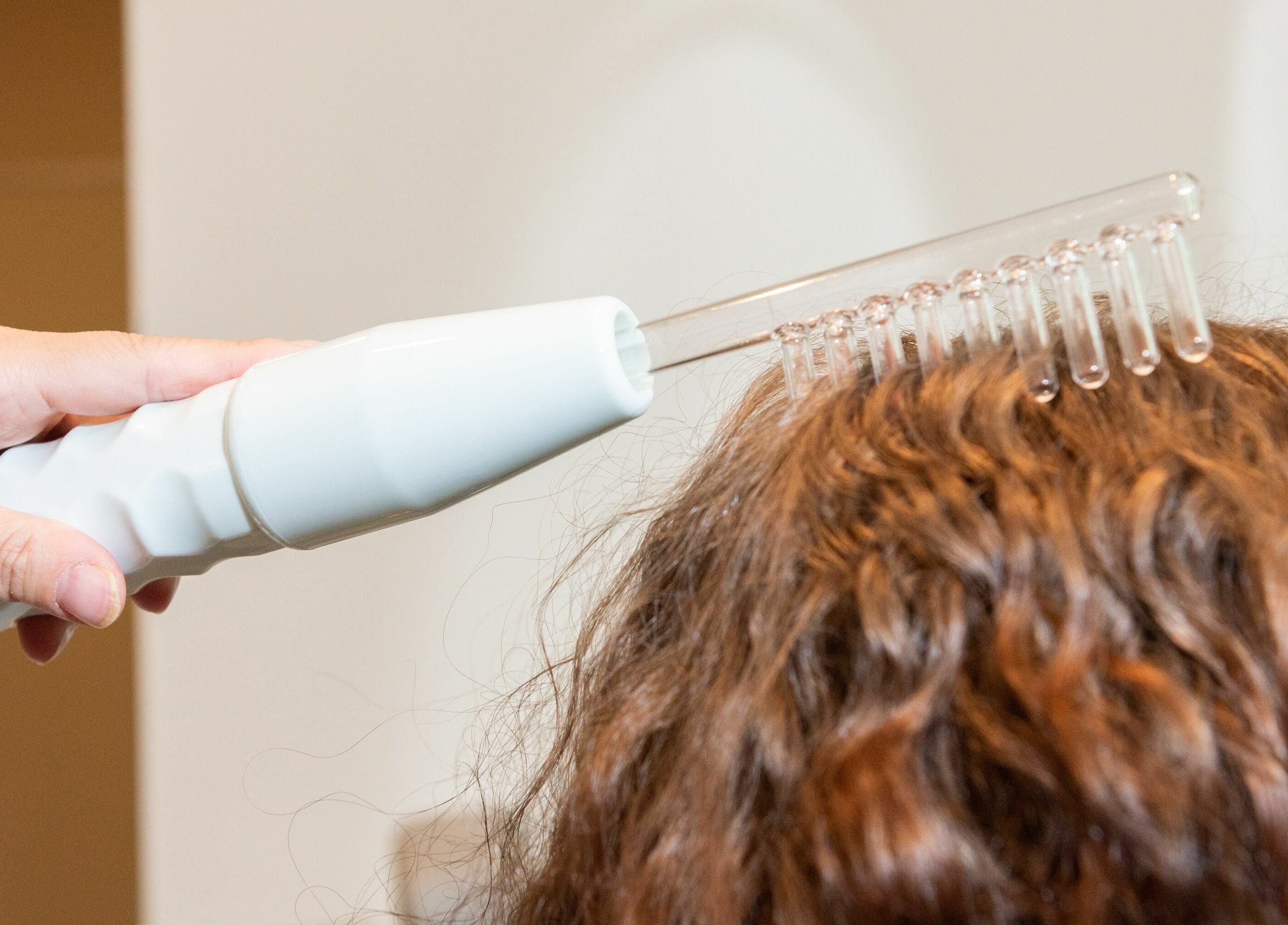 Electric scalp treatment at Tea Scalp & Hair Spa, Las Vegas, Nevada, US.