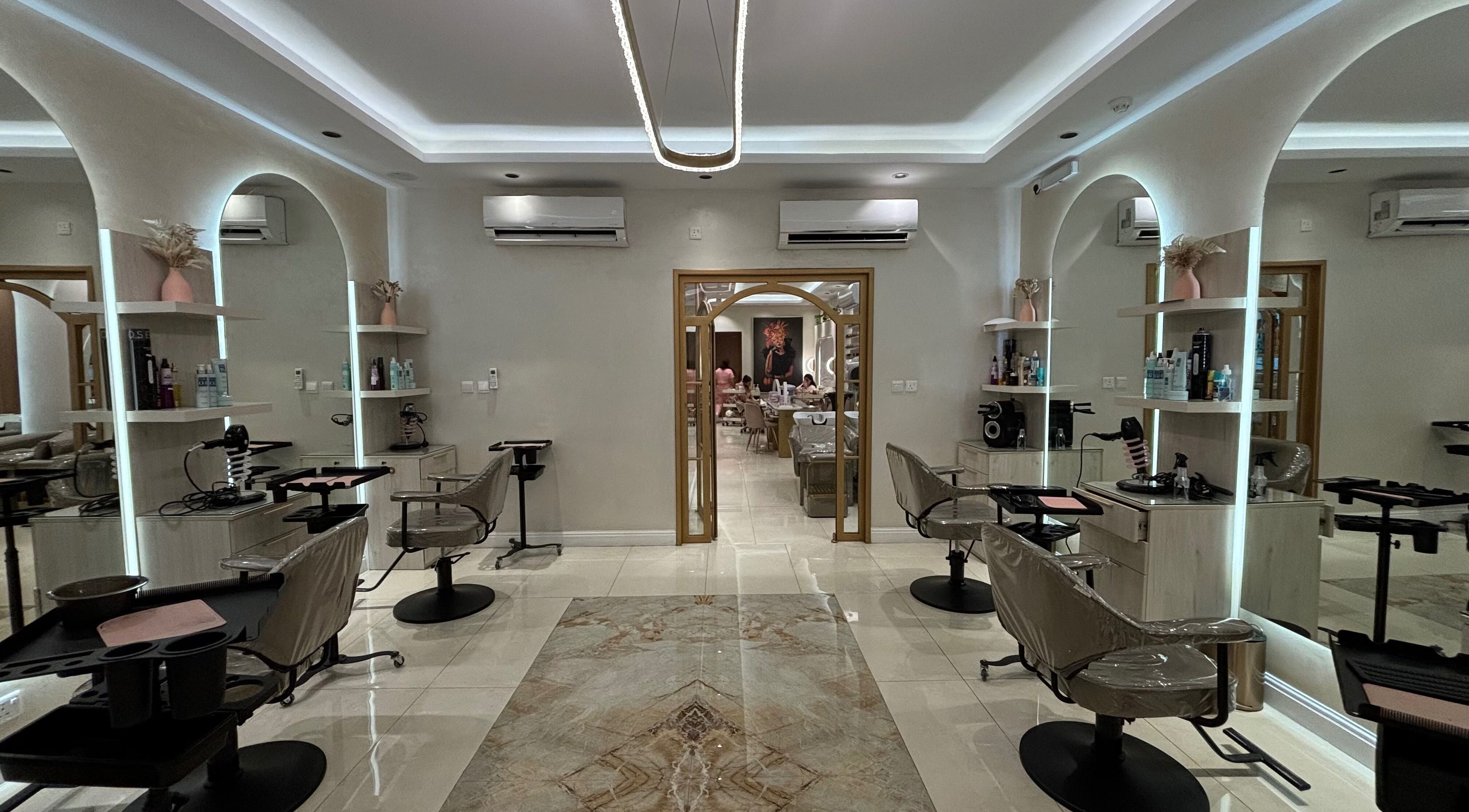 Modern salon interior at Wafaa Altamayoz, Jeddah, Makkah Province, SA, showcasing luxury and style.