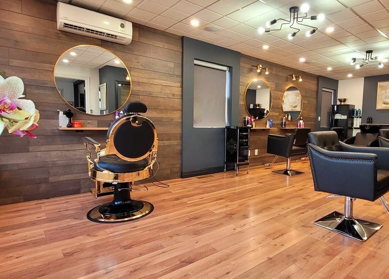 Chic salon interior at Style by Siwar Studio, Moncton, New Brunswick, CA, with modern decor and comfortable seating.