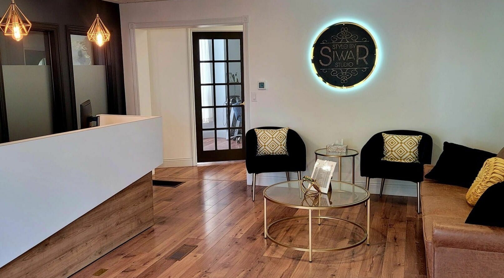 Modern reception area at Style by Siwar Studio, Moncton, New Brunswick, CA with sleek design elements.