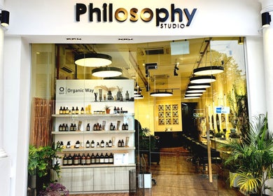 Entrance to Philosophy Studio in Singapore, SG, showcasing elegant interiors and stylish decor.