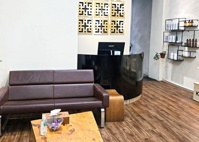 Elegant reception and cozy seating at Philosophy Studio, Singapore, Singapore, SG. Enhancing beauty and wellness.