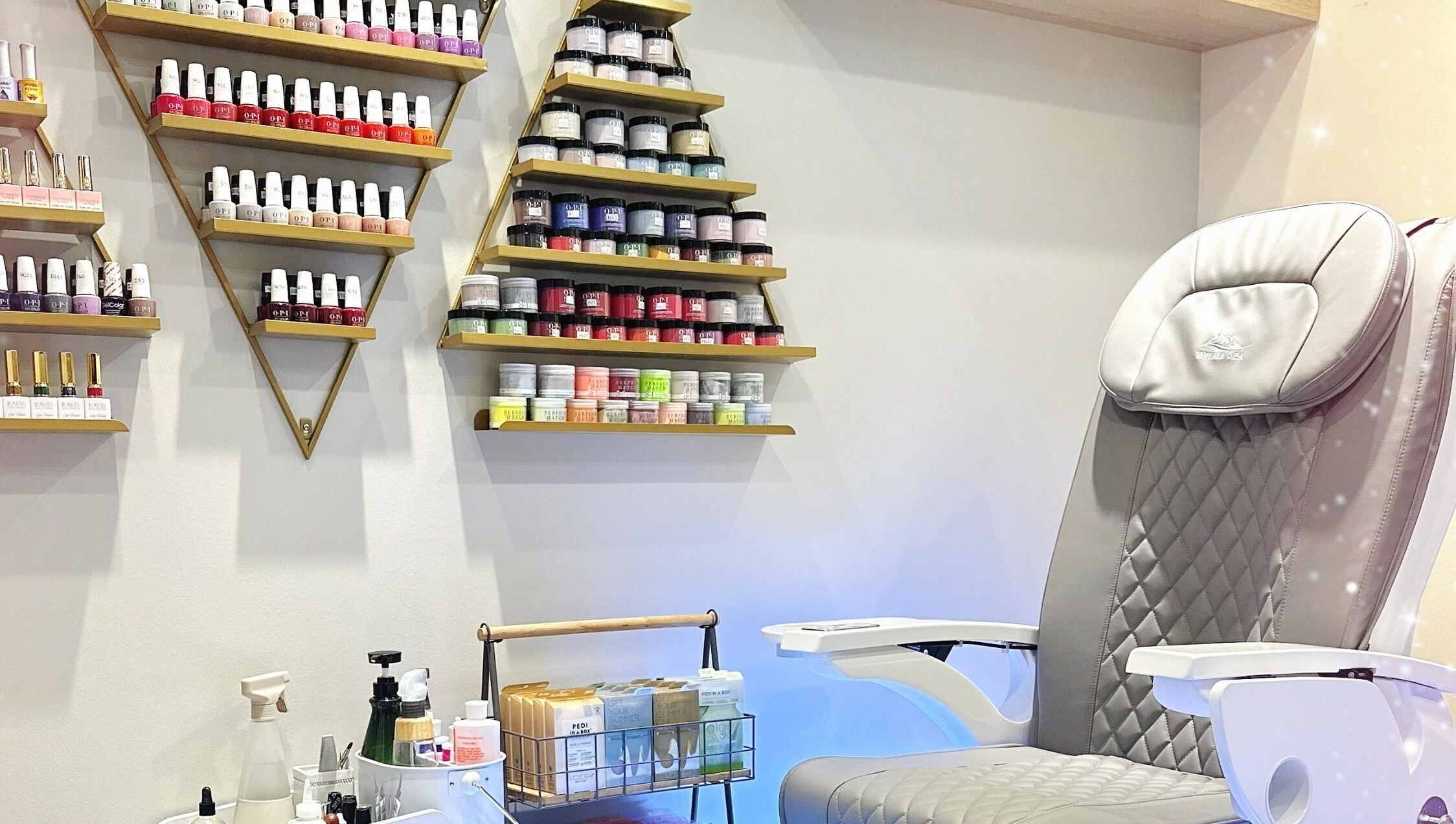 Glam E Nails salon in Arlington, Virginia, US features a luxurious pedicure chair and vibrant polish selection.