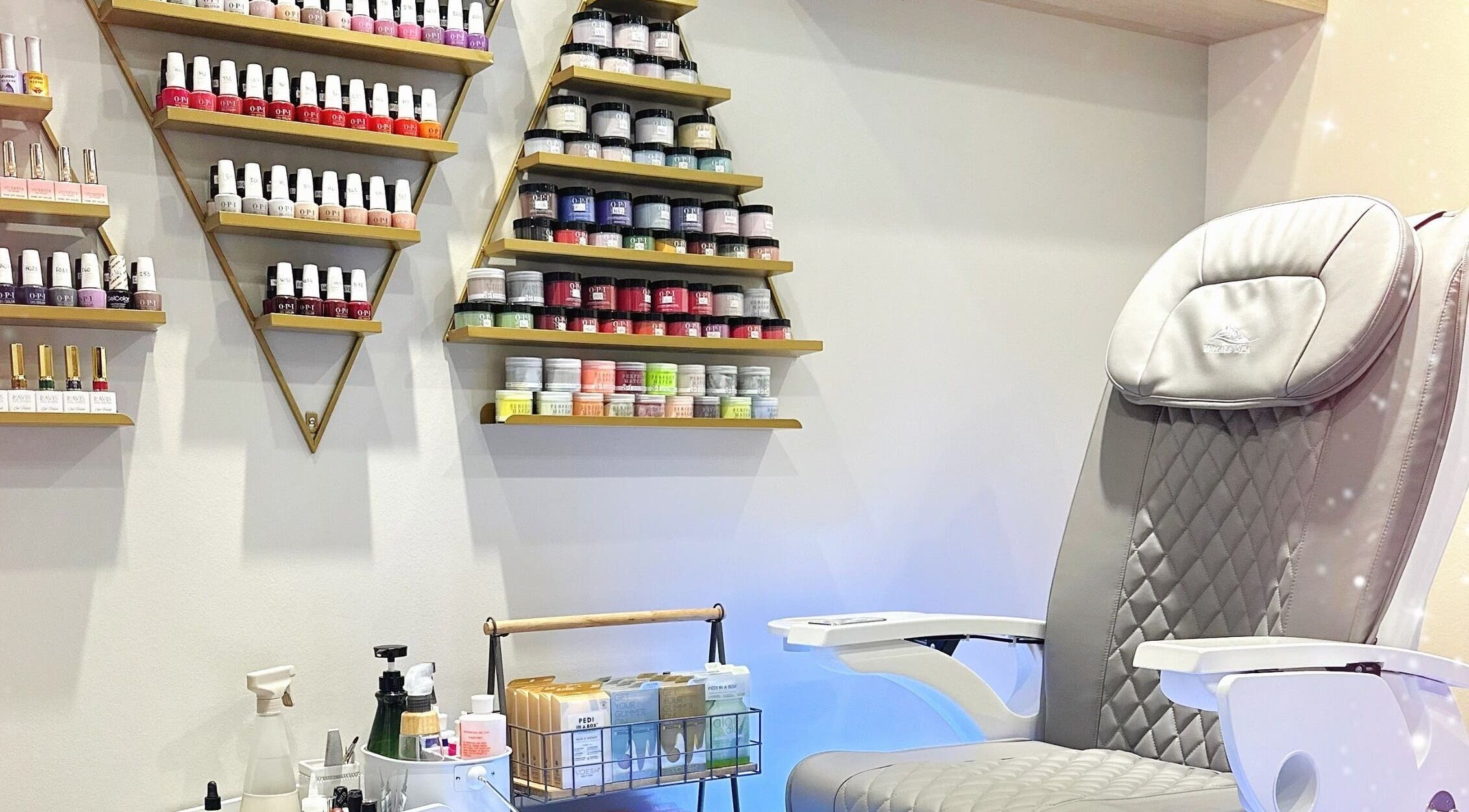 Glam E Nails salon in Arlington, Virginia, US features a luxurious pedicure chair and vibrant polish selection.