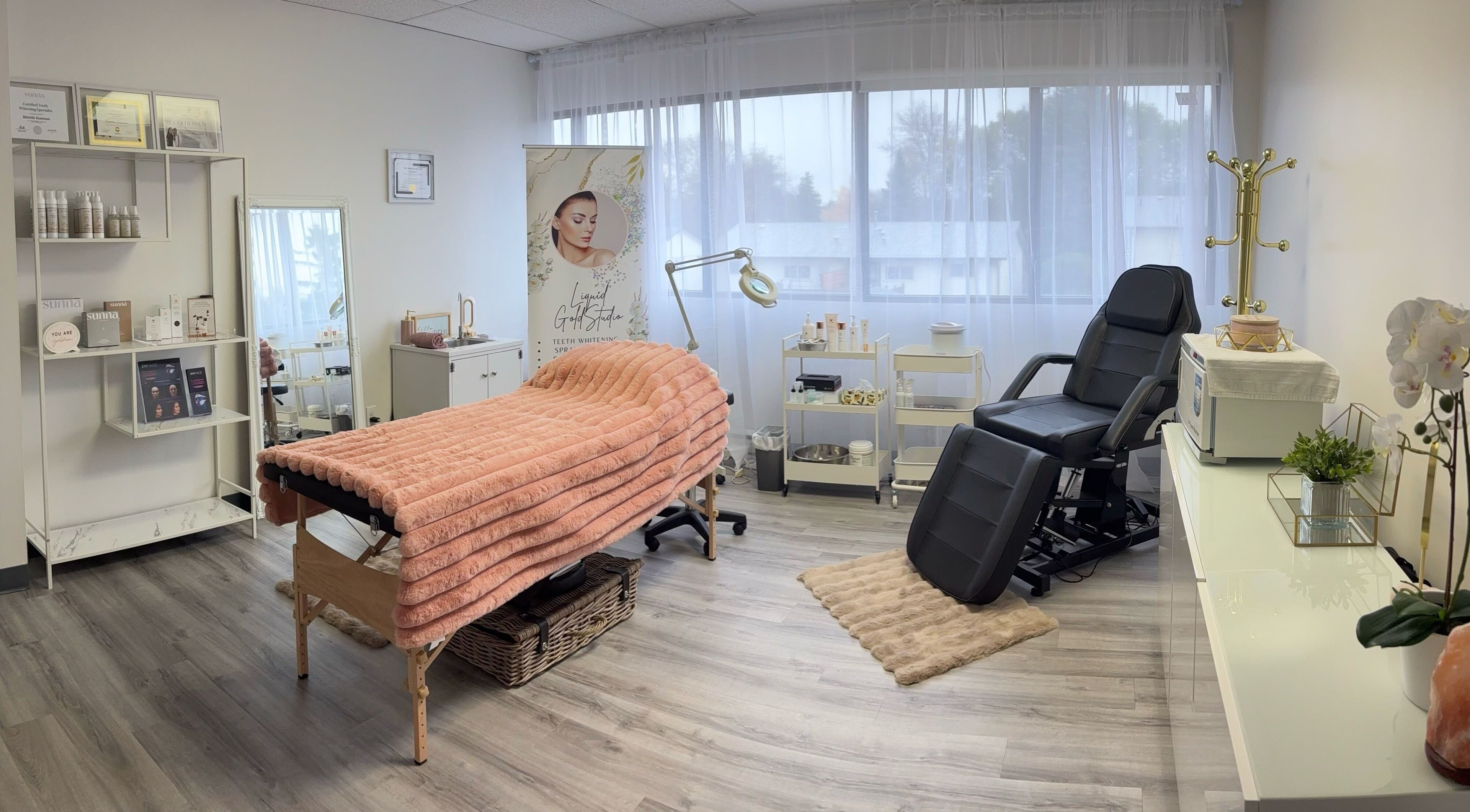 Tranquil treatment room at Liquid Gold Studio, Winnipeg, Manitoba, CA, featuring cozy decor and wellness essentials.