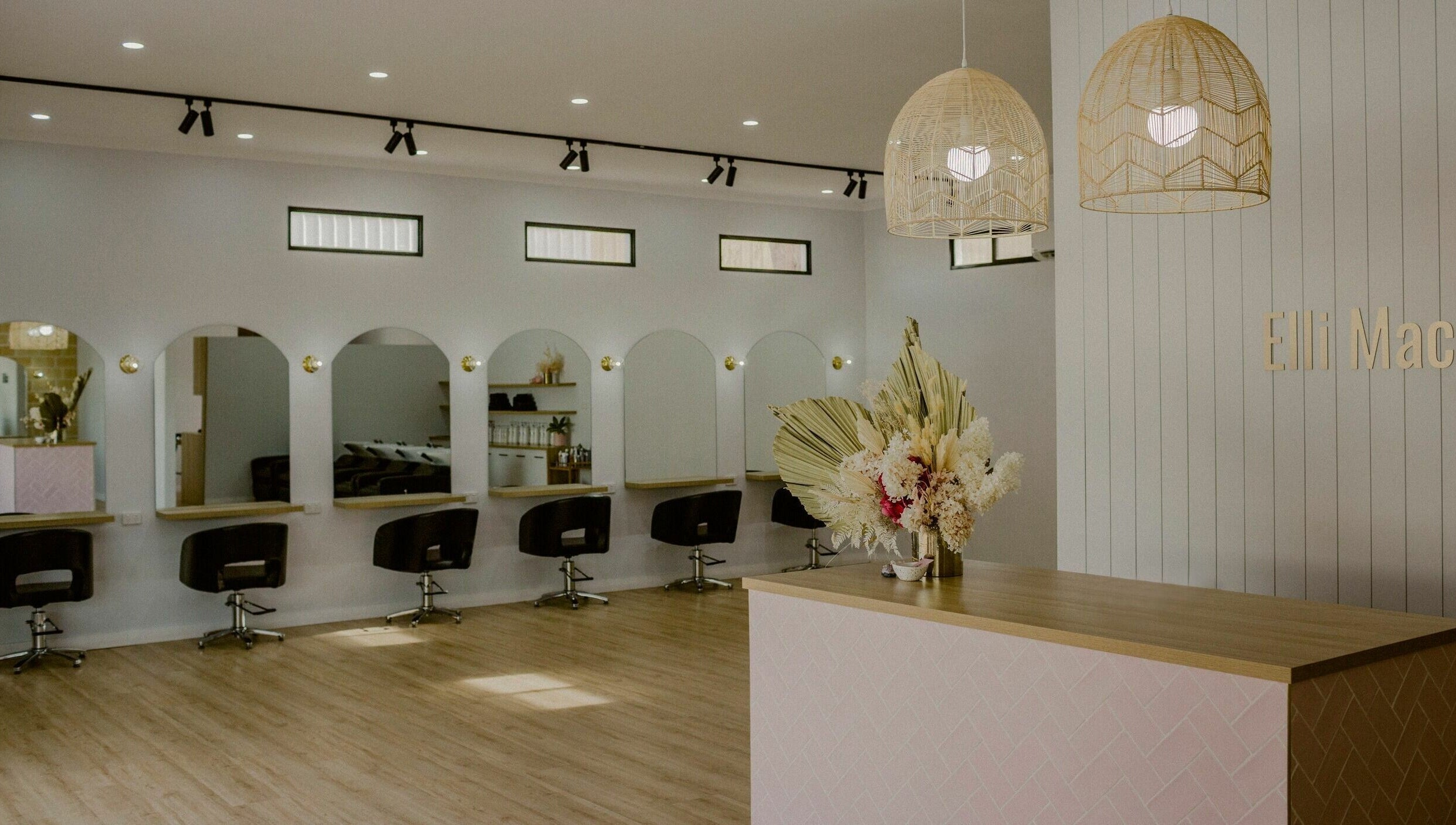 Stylish interior of Elli Mac Salon in Waroona, Western Australia, featuring chic seating and modern design.