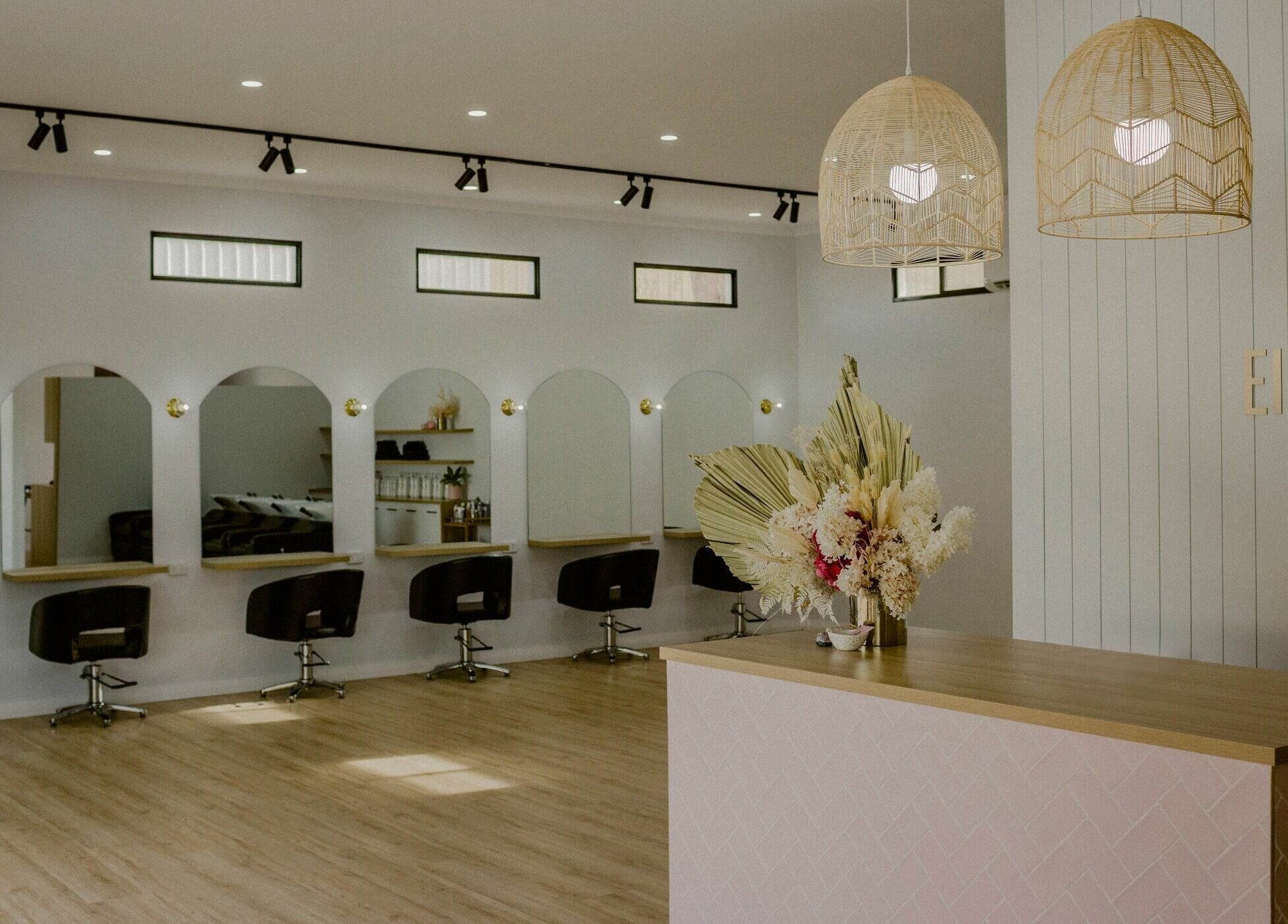 Stylish interior of Elli Mac Salon in Waroona, Western Australia, featuring chic seating and modern design.
