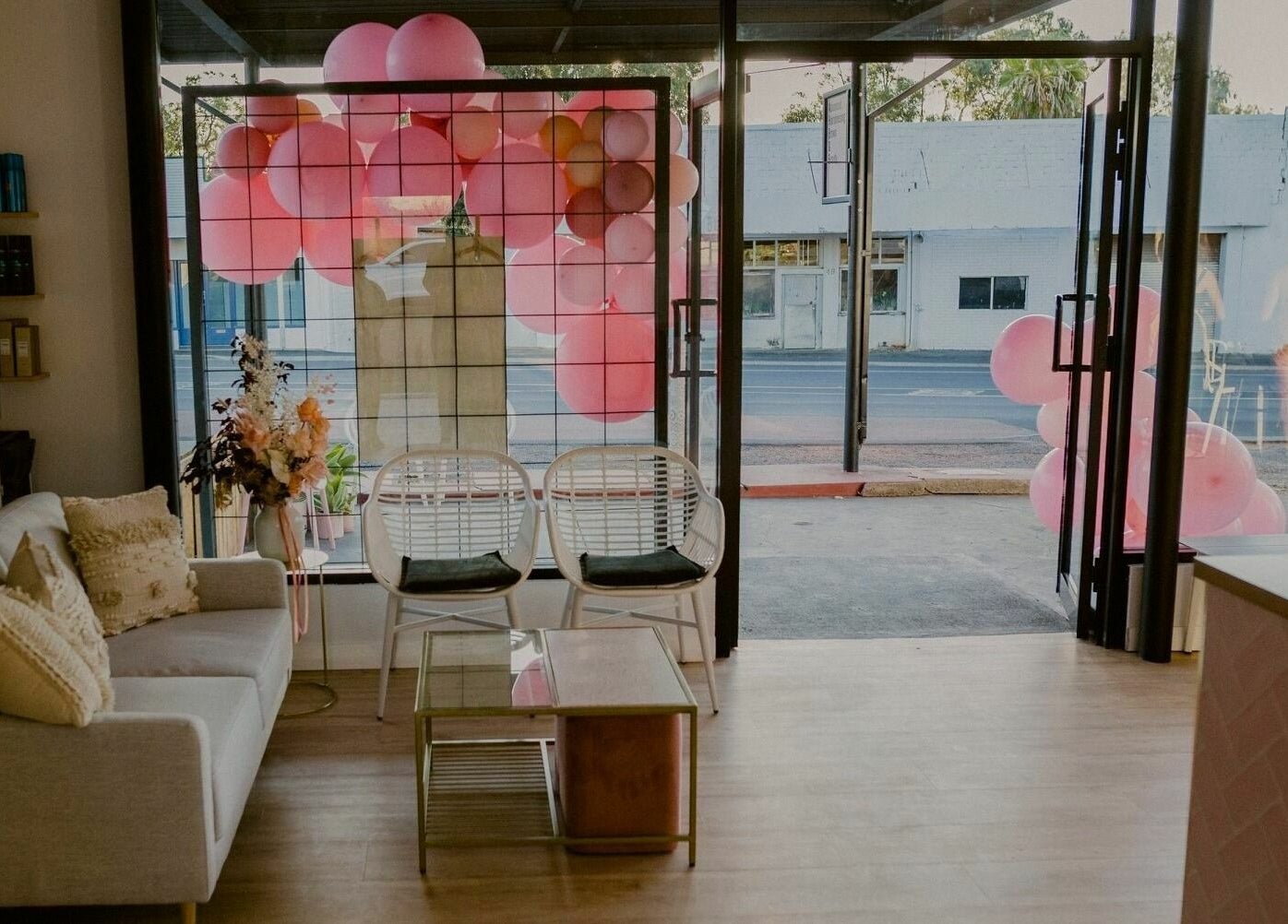 Inviting salon lounge at Elli Mac Salon, Waroona, Western Australia, with stylish decor and cozy seating.