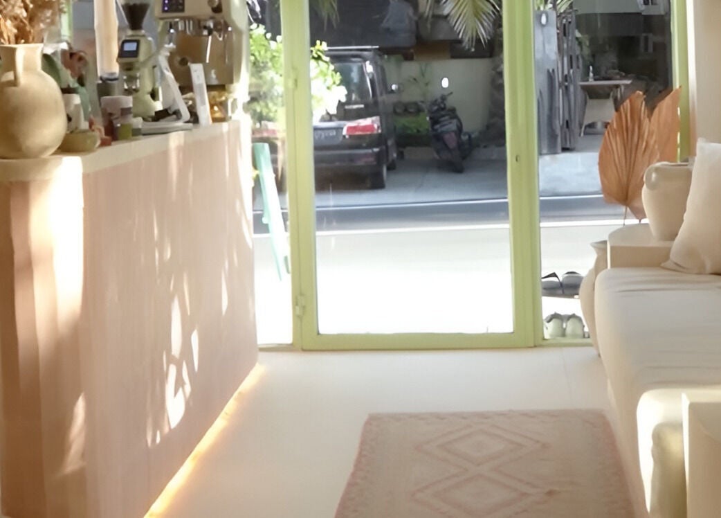 Peaceful reception area at Kind - Nails & Spa in Bali, Bali, ID with natural decor and soft lighting.