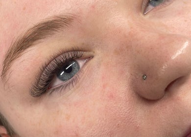 Close-up of elegant eyelash extensions at BeautyLuxe Lash Bar in Horsley, New South Wales, AU.
