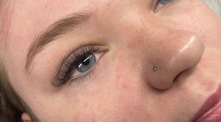 Close-up of elegant eyelash extensions at BeautyLuxe Lash Bar in Horsley, New South Wales, AU.