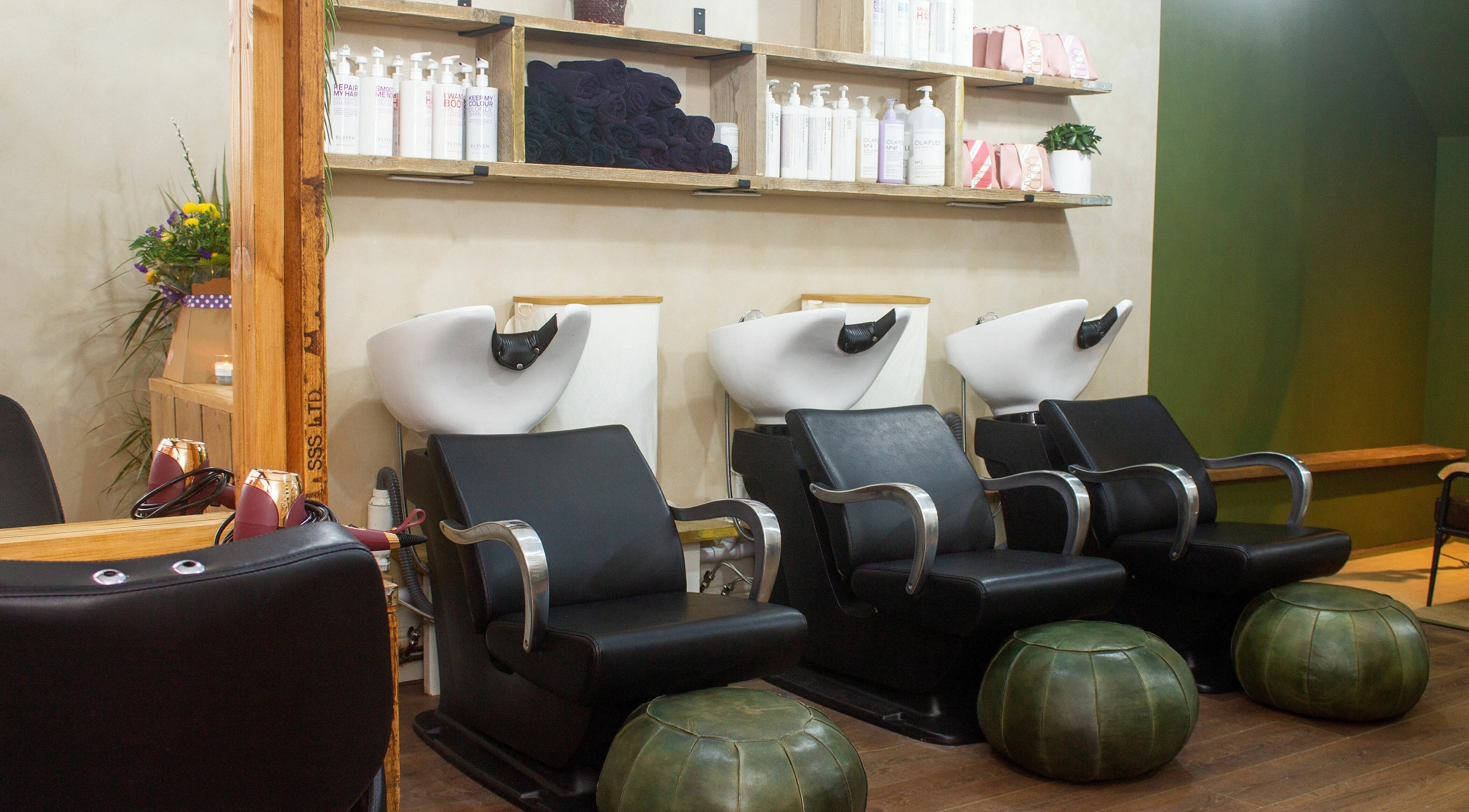 Stylish shampoo stations at The Workhouse Hair, Folkestone, England, GB offer a modern salon experience.