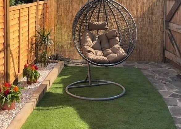 Relaxing garden swing chair at Mirror Mirror, Aylesford, England, GB, ideal for tranquil moments.