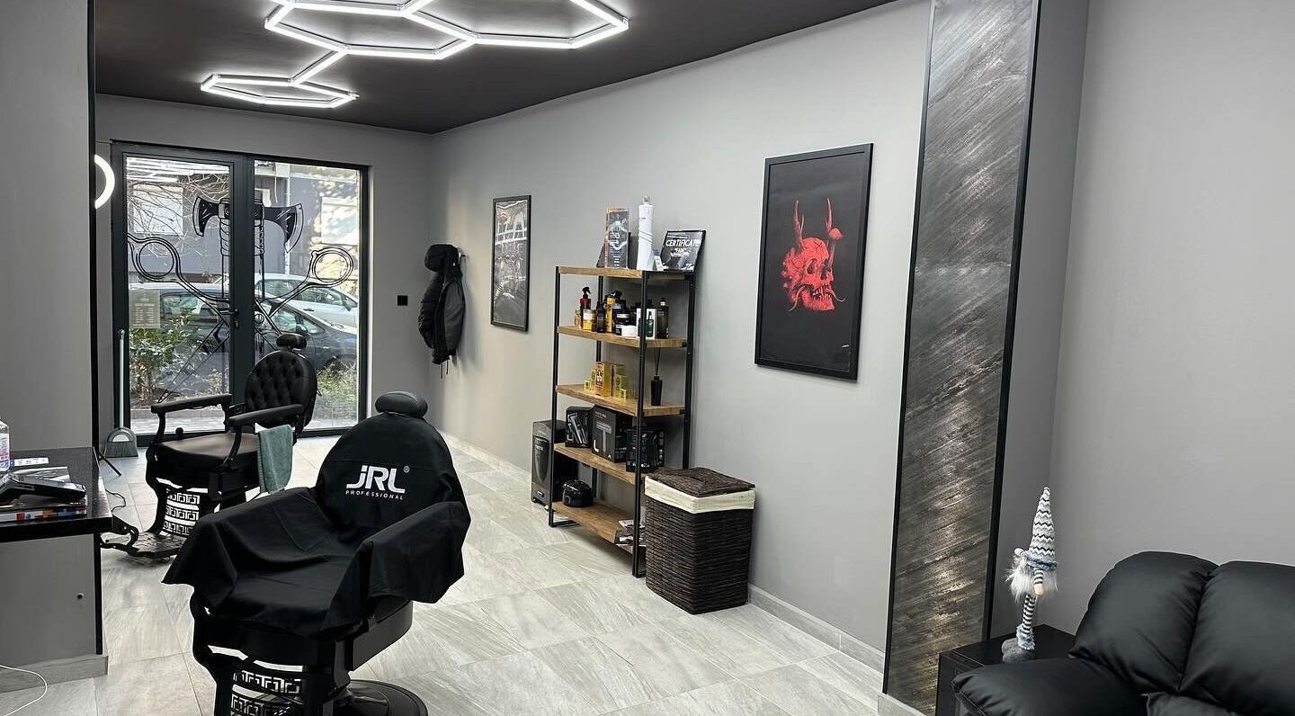 Sleek interior of Berserk Barbershop, Varna, Varna, BG. Stylish chairs and elegant decor create a modern vibe.