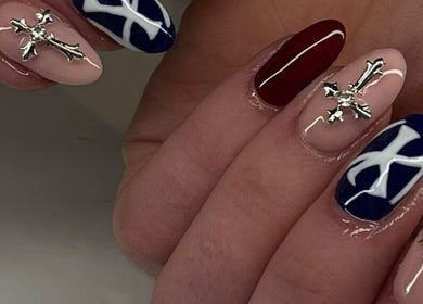 Stylish nail art with crosses and abstract design at The Beaute HQ, Melton Mowbray, England, GB.