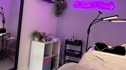 Cozy treatment room at ES Lash and Beauty, Kidderminster, England, GB with vibrant decor and a welcoming atmosphere.