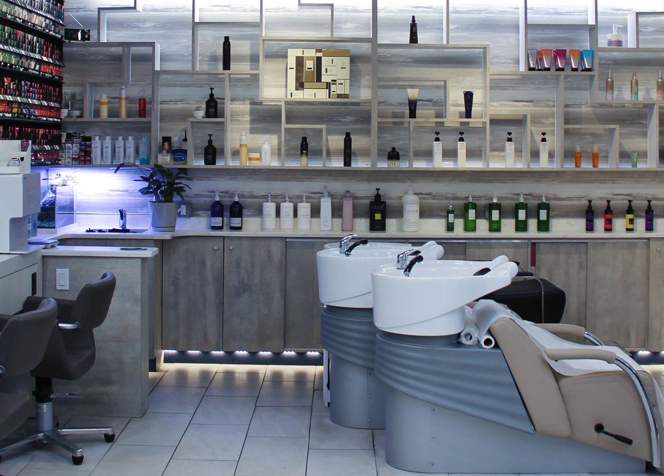 Elegant styling stations and shelves at Nova Salon in New York, New York, US showcase modern beauty design.