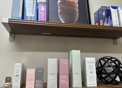 Products displayed on shelves at Maro Wellness Center Miami, Coral Gables, Florida, US. Dermalogica and Exel brands shown.