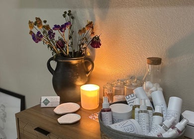 Calm ambiance with candle and beauty products at Maro Wellness Center Miami, Coral Gables, Florida, US.