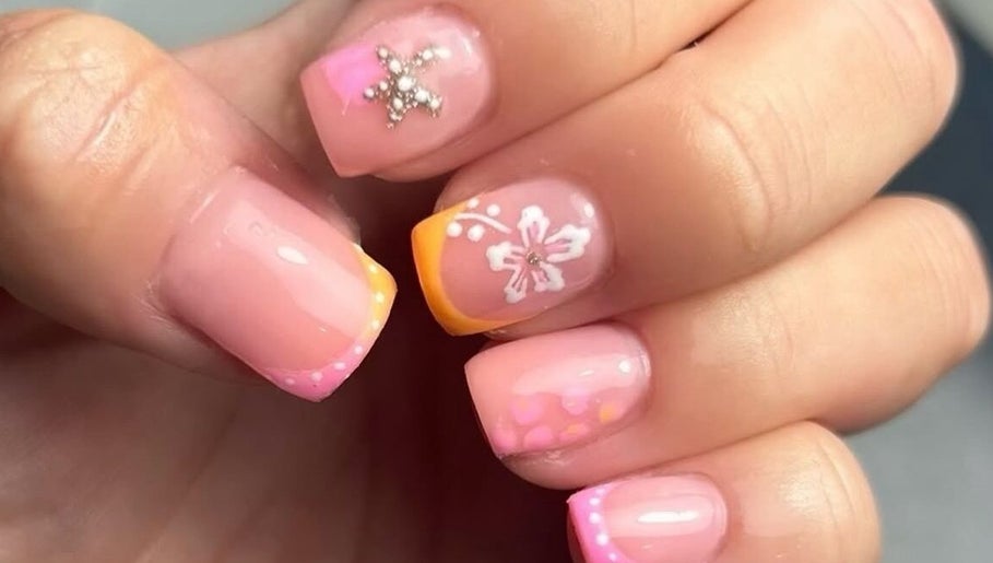 Floral-themed nail art at Millie Cooper Nails, Failsworth, England, GB, showcasing delicate designs and vibrant colors.