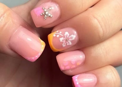 Floral-themed nail art at Millie Cooper Nails, Failsworth, England, GB, showcasing delicate designs and vibrant colors.